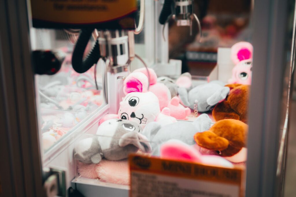 Souvenir vending machine with soft toys in it